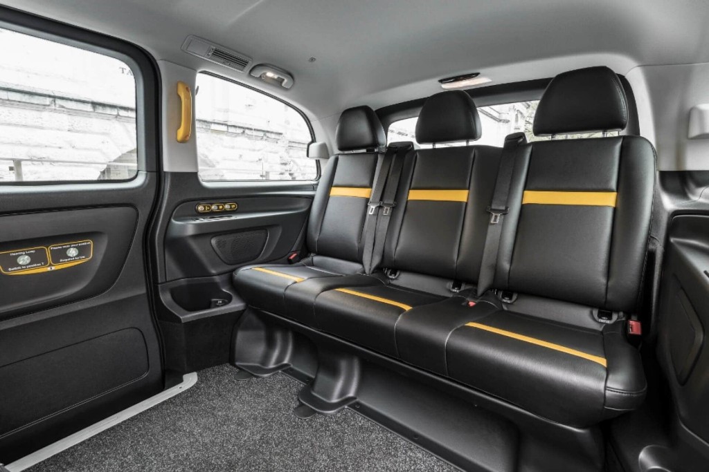 Leather bench seats inside an XL Mercedes Vito